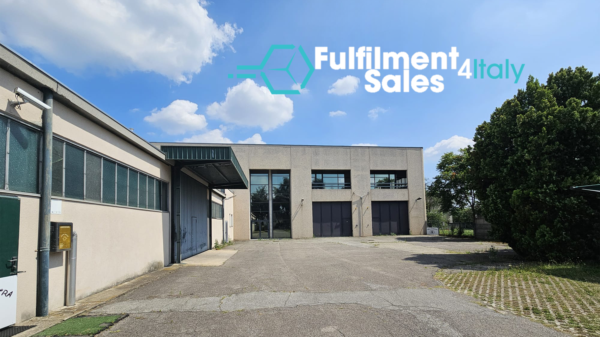 Fulfilment Sales 4Italy logo on warehouse building in sunny industrial area