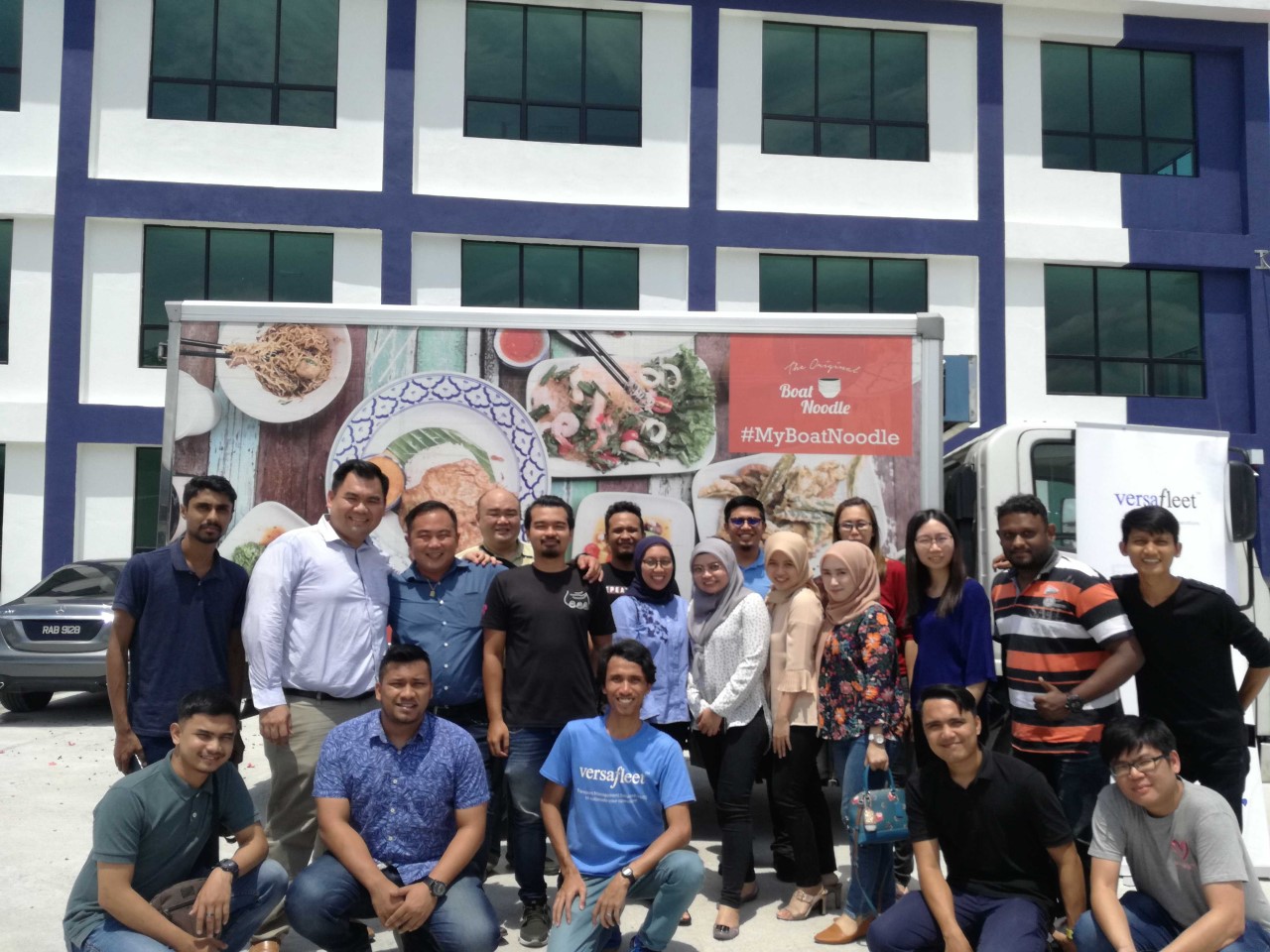 Picture of the versafleet team outside in the sun